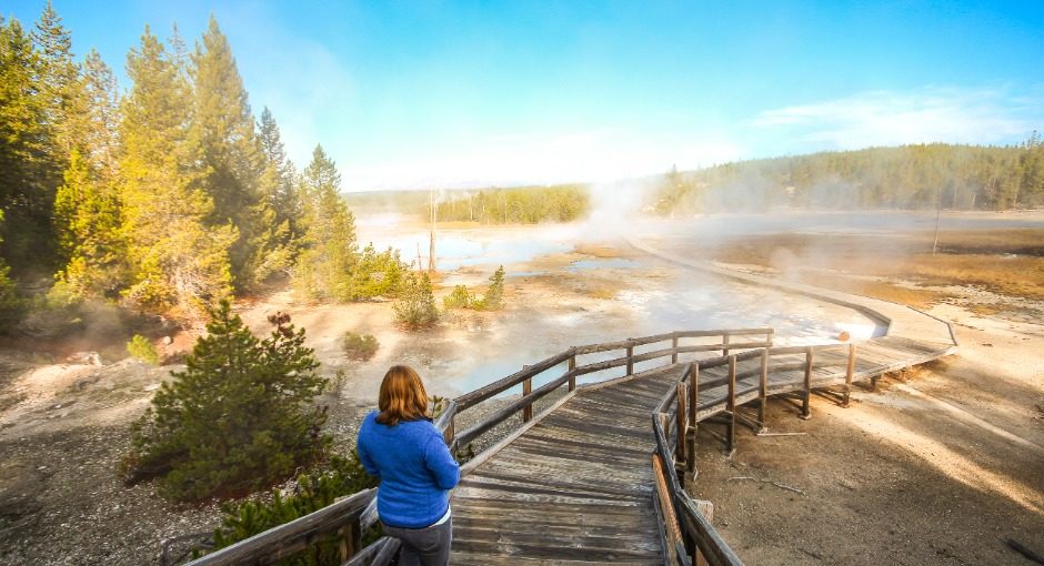 Norris Geyser Basin is best visited around dusk, when the crowds have dispersed and breathtaking sunsets paint the landscape.
