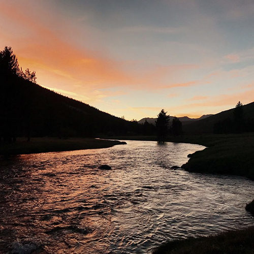 A high-sierra sunset reflected in the Tuolumne River in Lyell Canyon.
